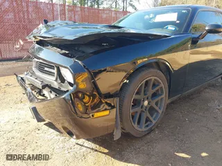 2013 Dodge Challenger SXT with VIN 2C3CDYAG5DH562557, listed as a IAAI auction lot 41694697 with 135,915 mi miles. Bid and sale history available at carsss.com. Image 18.