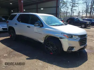 2021 Chevrolet Traverse Premier with VIN 1GNEVKKW7MJ138176, listed as a IAAI auction lot 41900819 with 84,477 mi miles. Bid and sale history available at carsss.com. Image 1.