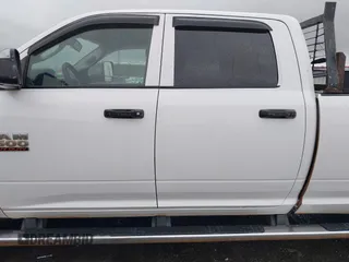 2015 Ram 2500 Tradesman z VIN 3C6TR5H29FG558981, wystawiony jako IAAI lot #41944923 z przebiegiem 262 459 mil mil oraz . Historia ofert i sprzedaży dostępna na DreamBid. Obrazek 14.