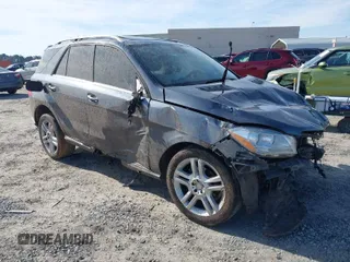 2014 Mercedes-Benz M ML 350 with VIN 4JGDA5JB2EA319263, listed as a IAAI auction lot 41464225 with 169,292 mi miles. Bid and sale history available at carsss.com. Image 1.