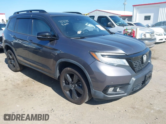 2019 Honda Passport Elite with VIN 5FNYF8H04KB004657, listed as a IAAI auction lot 41993974 with 90,964 mi miles and . Bid and sale history available at DreamBid. Image 1.