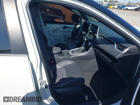 2021 Toyota RAV4 Hybrid XSE with VIN 4T3E6RFV3MU042773, listed as a IAAI auction lot 42000073 with 55,110 mi miles and . Bid and sale history available at DreamBid. Image 5.