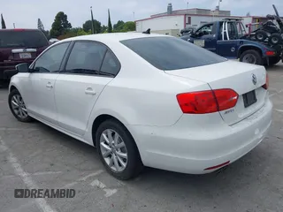 2011 Volkswagen Jetta SE with VIN 3VWDX7AJ2BM345251, listed as a IAAI auction lot 42407502 with 110,121 mi miles and . Bid and sale history available at DreamBid. Image 3.
