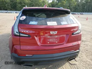 2021 Cadillac XT4 FWD Sport with VIN 1GYFZER49MF055918, listed as a Copart auction lot 69907613 with 36,138 mi miles and . Bid and sale history available at DreamBid. Image 6.