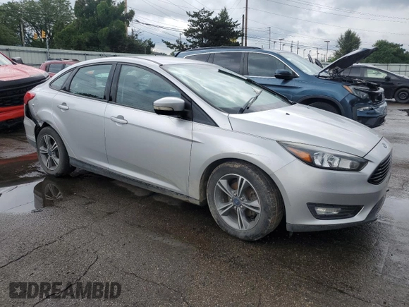 2016 Ford Focus SE with VIN 1FADP3FE5GL233081, listed as a Copart auction lot 65498195 with 89,674 mi miles and Salvage title. Bid and sale history available at DreamBid. Image 4.