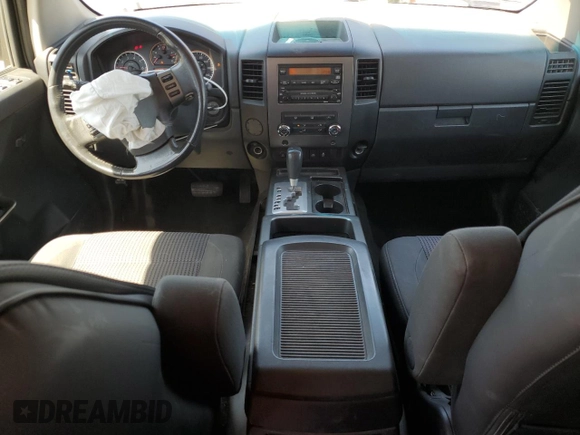 2012 Nissan Titan SV with VIN 1N6AA0ED3CN331091, listed as a Copart auction lot 57805625 with 106,693 mi miles and Salvage title. Bid and sale history available at DreamBid. Image 8.