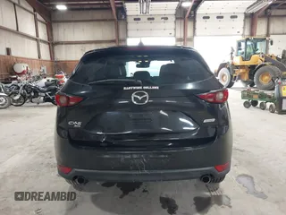 2017 Mazda CX-5 Grand Touring with VIN JM3KFBDL6H0143013, listed as a IAAI auction lot 41912979 with 122,890 mi miles. Bid and sale history available at carsss.com. Image 16.