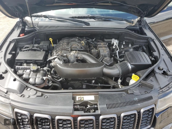 2019 Jeep Grand Cherokee Overland with VIN 1C4RJECG2KC767991, listed as a Copart auction lot 77366334 with 0 mi miles and Non Repairable. Bid and sale history available at carsss.com. Image 12.