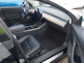 2018 Tesla Model 3 Long Range Battery with VIN 5YJ3E1EA9JF173461, listed as a IAAI auction lot 41777635 with 58579 miles. Bid and sale history available at carsss.com. Image 5.