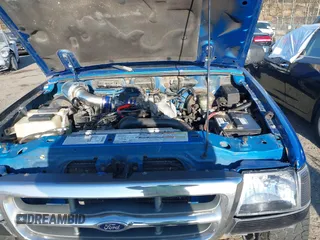 2000 Ford Ranger XL with VIN 1FTYR14C7YTA97775, listed as a IAAI auction lot 40771596 with 180,788 mi miles. Bid and sale history available at carsss.com. Image 10.