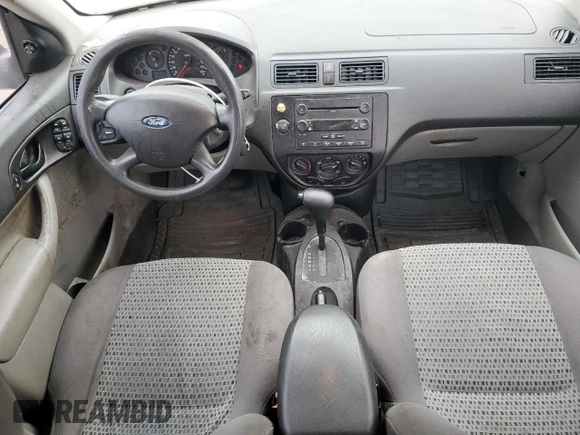 2007 Ford Focus S z VIN 1FAFP34N97W236303, wystawiony jako Copart lot #55248765 z przebiegiem 125 900 mil mil oraz Szkoda całkowita • Salvage title. Historia ofert i sprzedaży dostępna na DreamBid. Obrazek 8.