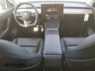 2022 Tesla Model Y Performance with VIN 7SAYGDEF3NF490643, listed as a Copart auction lot 46975825 with 50,792 mi miles and Salvage Title. Bid and sale history available at DreamBid. Image 8.
