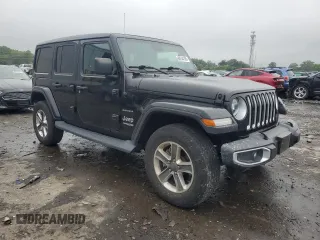 2019 Jeep Wrangler Unlimited Sahara z VIN 1C4HJXEN7KW612273, wystawiony jako Copart lot #60744185 z przebiegiem 55 176 mil mil oraz Szkoda całkowita • Salvage title. Historia ofert i sprzedaży dostępna na DreamBid. Obrazek 4.