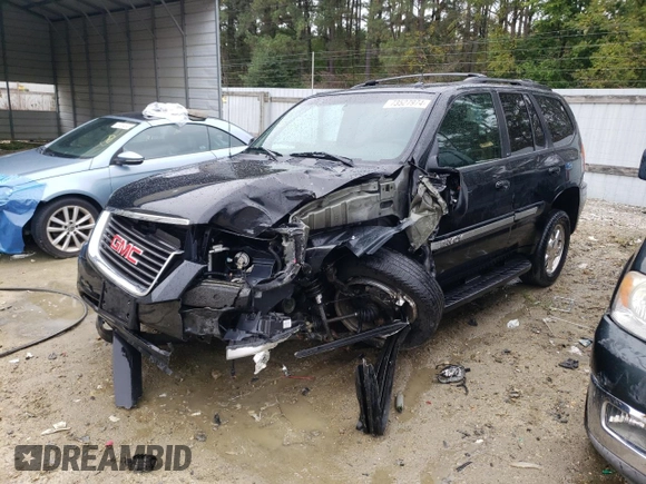 2004 GMC Envoy SLT with VIN 1GKDT13S942279670, listed as a Copart auction lot 73527974 with 120,425 mi miles and Salvage Title. Bid and sale history available at DreamBid. Image 1.