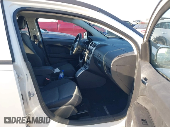 2008 Dodge Caliber SXT with VIN 1B3HB48B38D668777, listed as a IAAI auction lot 41202480 with 156,790 mi miles and . Bid and sale history available at DreamBid. Image 5.