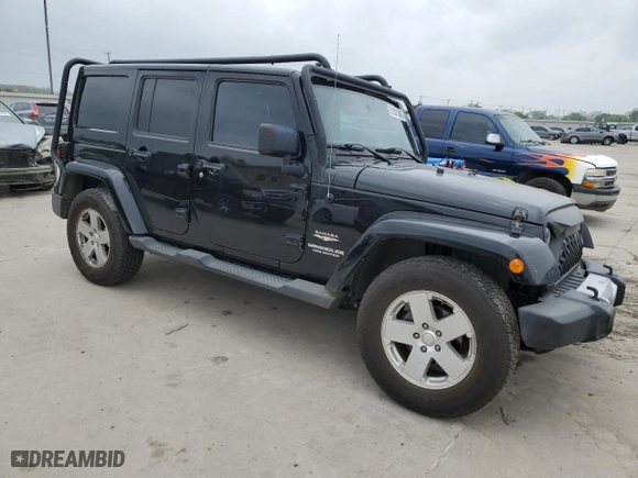 2011 Jeep Wrangler Unlimited Sahara with VIN 1J4HA5H13BL546703, listed as a Copart auction lot 51521845 with 127,132 mi miles and Salvage Title. Bid and sale history available at carsss.com. Image 4.