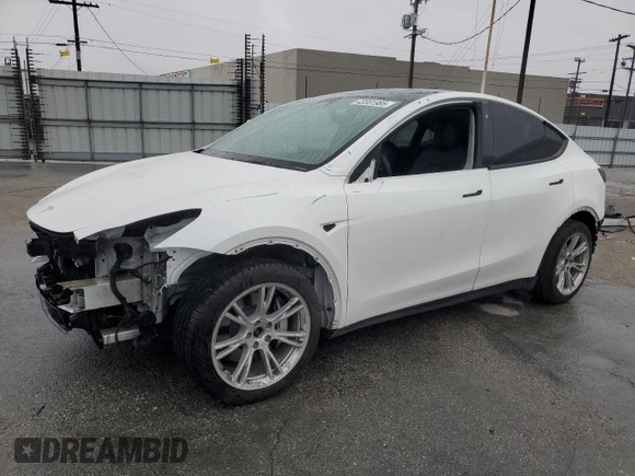 2020 Tesla Model Y Long Range with VIN 5YJYGDEE5LF053938, listed as a Copart auction lot 43381985 with 69,291 mi miles and Salvage Title. Bid and sale history available at DreamBid. Image 1.