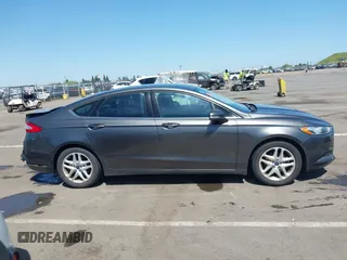 2015 Ford Fusion SE with VIN 3FA6P0H7XFR306483, listed as a IAAI auction lot 42033062 with 159,922 mi miles and . Bid and sale history available at DreamBid. Image 14.