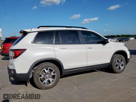 2023 Honda Passport TrailSport with VIN 5FNYF8H64PB007652, listed as a Copart auction lot 54064025 with 22,870 mi miles and Salvage title. Bid and sale history available at DreamBid. Image 3.