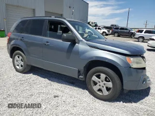 2006 Suzuki Grand Vitara Premium with VIN JS3TD943964102832, listed as a Copart auction lot 59971694 with 148,329 mi miles and Salvage title. Bid and sale history available at DreamBid. Image 4.