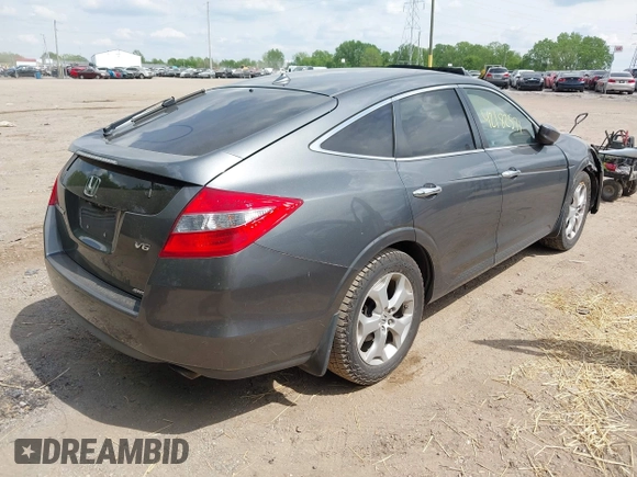 2012 Honda Crosstour EX-L z VIN 5J6TF2H53CL011899, wystawiony jako IAAI lot #42182571 z przebiegiem 154 801 mil mil oraz . Historia ofert i sprzedaży dostępna na DreamBid. Obrazek 4.