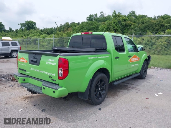 2020 Nissan Frontier SV with VIN 1N6ED0EA1LN711089, listed as a IAAI auction lot 42356365 with 59,059 mi miles and . Bid and sale history available at DreamBid. Image 4.