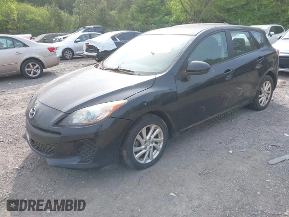 2012 Mazda Mazda3 i Touring with VIN JM1BL1L77C1559753, listed as a IAAI auction lot 42037094 with 145,659 mi miles. Bid and sale history available at carsss.com. Image 2.