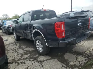2023 Ford Ranger XL with VIN 1FTER4FH9PLE12457, listed as a Copart auction lot 52674865 with 51,417 mi miles and Salvage title. Bid and sale history available at DreamBid. Image 2.