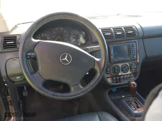2001 Mercedes-Benz M-Class with VIN 4JGAB72E51A247926, listed as a IAAI auction lot 41277111 with 208,817 mi miles. Bid and sale history available at carsss.com. Image 16.