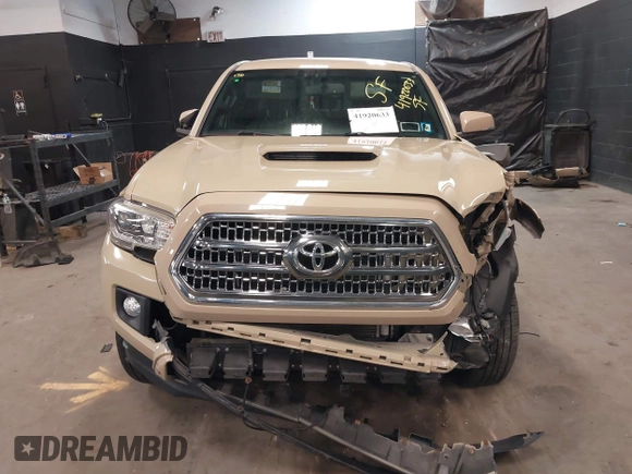 2016 Toyota Tacoma SR with VIN 5TFCZ5AN4GX033255, listed as a IAAI auction lot 41920633 with 71,681 mi miles and . Bid and sale history available at carsss.com. Image 12.