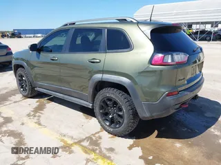 2019 Jeep Cherokee Trailhawk Elite with VIN 1C4PJMBN7KD287506, listed as a IAAI auction lot 42072589 with 108,034 mi miles and . Bid and sale history available at DreamBid. Image 3.
