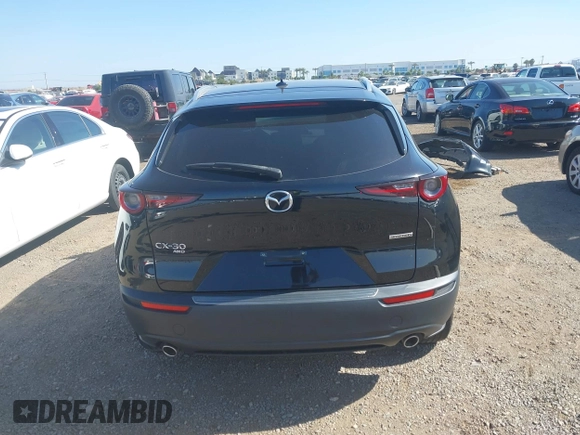 2022 Mazda CX-30 S Premium with VIN 3MVDMBDL6NM407913, listed as a IAAI auction lot 42359860 with 35,804 mi miles and . Bid and sale history available at DreamBid. Image 17.