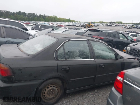 2000 Honda Civic LX with VIN 1HGEJ6674YL005143, listed as a IAAI auction lot 41961215 with 252,818 mi miles. Bid and sale history available at carsss.com. Image 13.