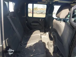 2021 Jeep Gladiator Overland z VIN 1C6HJTFG1ML606215, wystawiony jako IAAI lot #41771646 z przebiegiem 77 411 mil mil oraz . Historia ofert i sprzedaży dostępna na DreamBid. Obrazek 8.