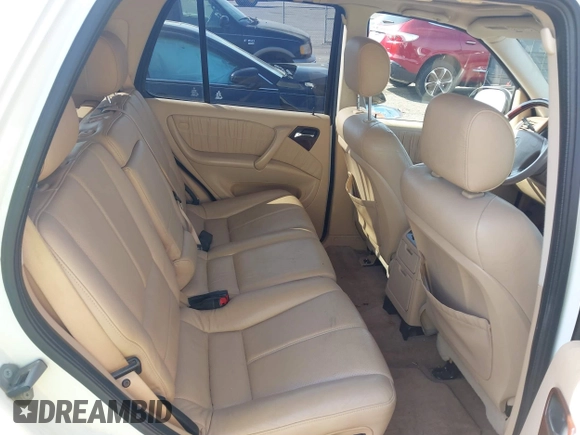 2000 Mercedes-Benz M with VIN 4JGAB54E4YA145383, listed as a IAAI auction lot 42108505 with 266,728 mi miles. Bid and sale history available at carsss.com. Image 8.