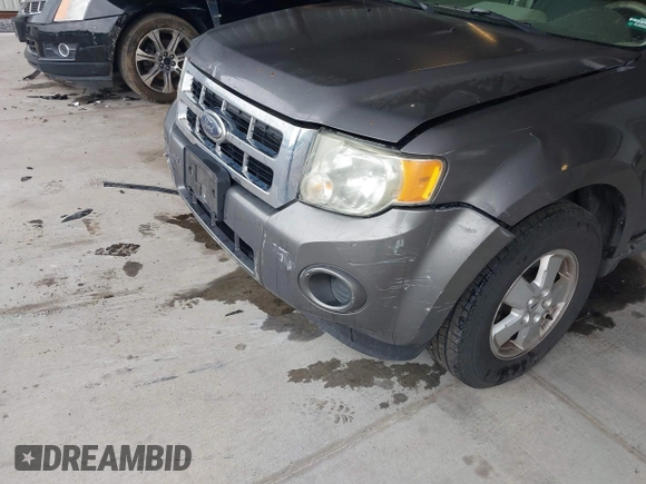 2009 Ford Escape XLS with VIN 1FMCU02759KC84959, listed as a IAAI auction lot 42219257 with 263,087 mi miles and . Bid and sale history available at DreamBid. Image 6.