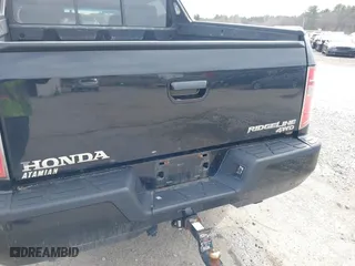 2011 Honda Ridgeline RTS with VIN 5FPYK1F4XBB453373, listed as a IAAI auction lot 41837086 with 268,041 mi miles. Bid and sale history available at carsss.com. Image 6.