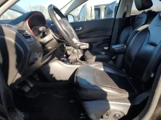 2019 Jeep Compass Trailhawk with VIN 3C4NJDDB1KT727756, listed as a Copart auction lot 42439055 with 104,525 mi miles and Salvage Title. Bid and sale history available at carsss.com. Image 7.