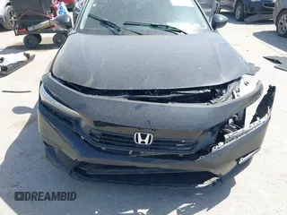 2024 Honda Civic Touring z VIN 2HGFE1F9XRH326146, wystawiony jako IAAI lot #41835336 z przebiegiem 8 469 mil mil oraz . Historia ofert i sprzedaży dostępna na DreamBid. Obrazek 12.
