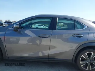 2019 Lexus UX with VIN JTHY3JBH6K2002909, listed as a IAAI auction lot 41980292 with 28,964 mi miles. Bid and sale history available at carsss.com. Image 14.