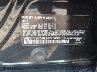 2014 BMW M5 with VIN WBSFV9C50ED097488, listed as a IAAI auction lot 41185321 with 72,891 mi miles. Bid and sale history available at carsss.com. Image 9.