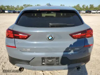 2021 BMW X2 xDrive28i with VIN WBXYJ1C04M5S07696, listed as a Copart auction lot 73412384 with 35,004 mi miles and Salvage Title. Bid and sale history available at carsss.com. Image 6.