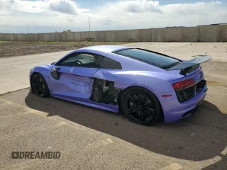 2017 Audi R8 z VIN WUAKBAFX2H7903141, wystawiony jako Copart lot #46552054 z przebiegiem 20 096 mil mil oraz . Historia ofert i sprzedaży dostępna na DreamBid. Obrazek 2.