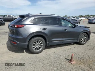 2019 Mazda CX-9 Touring with VIN JM3TCBCY0K0309947, listed as a Copart auction lot 56897815 with 87,517 mi miles and Salvage title. Bid and sale history available at DreamBid. Image 3.