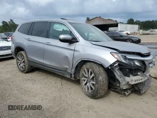 2021 Honda Pilot EX-L with VIN 5FNYF5H54MB018989, listed as a Copart auction lot 55721405 with 121,359 mi miles and Salvage Title. Bid and sale history available at carsss.com. Image 4.
