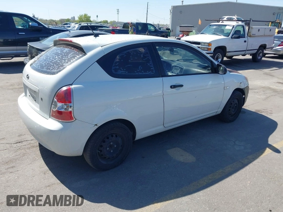 2008 Hyundai Accent GS with VIN KMHCM36CX8U073896, listed as a IAAI auction lot 42088516 with 182,092 mi miles. Bid and sale history available at carsss.com. Image 4.