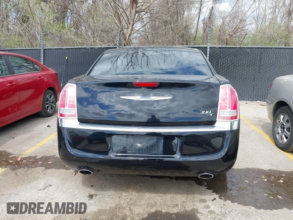 2012 Chrysler 300 with VIN 2C3CCAET1CH284661, listed as a IAAI auction lot 41920717 with 123,505 mi miles. Bid and sale history available at carsss.com. Image 16.