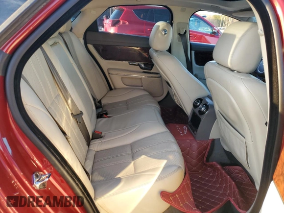 2012 Jaguar XJ with VIN SAJWA1CB3CLV37685, listed as a Copart auction lot 87586005 with 59,885 mi miles and Salvage title. Bid and sale history available at DreamBid. Image 10.