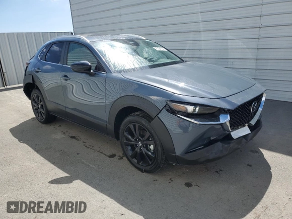 2025 Mazda CX-30 S Carbon Edition z VIN 3MVDMBCM2SM799150, wystawiony jako Copart lot #50815975 z przebiegiem 223 mil mil oraz Szkoda całkowita • Salvage title. Historia ofert i sprzedaży dostępna na DreamBid. Obrazek 4.