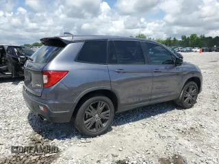 2021 Honda Passport EX-L with VIN 5FNYF8H54MB002017, listed as a Copart auction lot 59850975 with 54,275 mi miles and Salvage title. Bid and sale history available at DreamBid. Image 3.